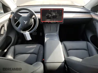 2024 Tesla Model Y Long Range with VIN 7SAYGDEE0RF034080, listed as a Copart auction lot 48329125 with 33,448 mi miles and Salvage Title. Bid and sale history available at carsss.com. Image 8.