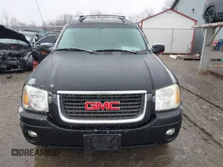 2005 GMC Envoy XL SLE with VIN 1GKET16S156160473, listed as a IAAI auction lot 41510661 with 233,942 mi miles. Bid and sale history available at carsss.com. Image 12.