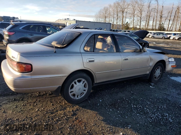 1994 Toyota Camry XLE with VIN JT2GK13E0R0038694, listed as a Copart auction lot 87843865 with 175,134 mi miles and Salvage Title. Bid and sale history available at carsss.com. Image 3.