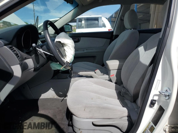 2010 Kia Optima LX z VIN KNAGG4A8XA5382979, wystawiony jako Copart lot #57067065 z przebiegiem 104 611 mil mil oraz Szkoda całkowita • Salvage title. Historia ofert i sprzedaży dostępna na DreamBid. Obrazek 7.