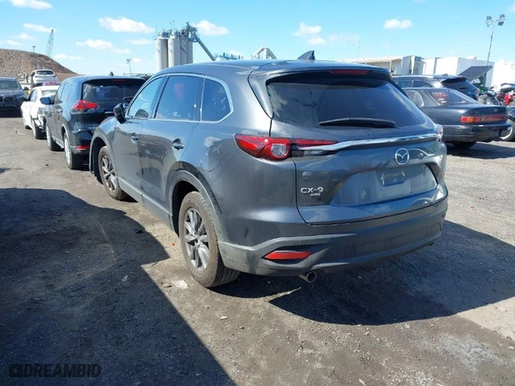 2023 Mazda CX-9 Touring with VIN JM3TCBCY1P0635828, listed as a IAAI auction lot 41743004 with NaN miles. Bid and sale history available at carsss.com. Image 3.