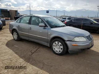 2004 Volkswagen Passat GL z VIN WVWMD63B14E114877, wystawiony jako Copart lot #45497355 z przebiegiem 161 554 mil mil oraz Szkoda całkowita • Salvage title. Historia ofert i sprzedaży dostępna na DreamBid. Obrazek 4.