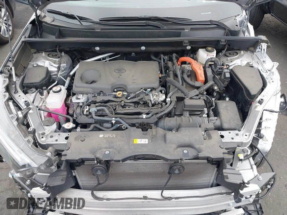 2022 Toyota RAV4 Hybrid SE z VIN 4T3T6RFV9NU070229, wystawiony jako IAAI lot #42565070 z przebiegiem 21 901 mil mil oraz . Historia ofert i sprzedaży dostępna na DreamBid. Obrazek 10.