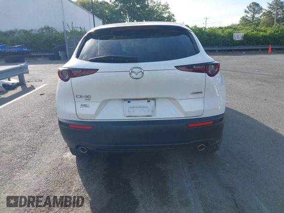 2023 Mazda CX-30 S with VIN 3MVDMBAM8PM545288, listed as a IAAI auction lot 42198433 with 19,609 mi miles and . Bid and sale history available at DreamBid. Image 16.