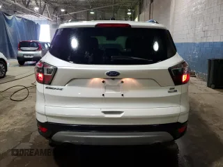 2017 Ford Escape SE with VIN 1FMCU9GD4HUA12697, listed as a Copart auction lot 51383765 with 145,122 mi miles and Clean Title. Bid and sale history available at carsss.com. Image 6.
