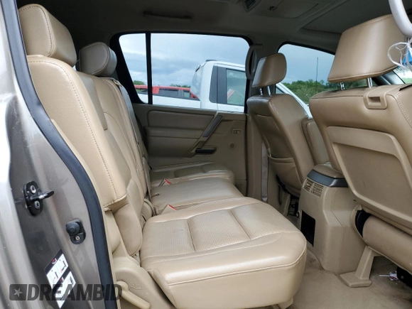 2006 Nissan Armada LE z VIN 5N1AA08B76N710950, wystawiony jako Copart lot #55981715 z przebiegiem 242 233 mil mil oraz Szkoda całkowita • Salvage title. Historia ofert i sprzedaży dostępna na DreamBid. Obrazek 11.