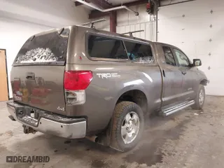 2013 Toyota Tundra 4WD Truck with VIN 5TFUY5F11DX276529, listed as a IAAI auction lot 41478638 with 131,197 mi miles. Bid and sale history available at carsss.com. Image 4.