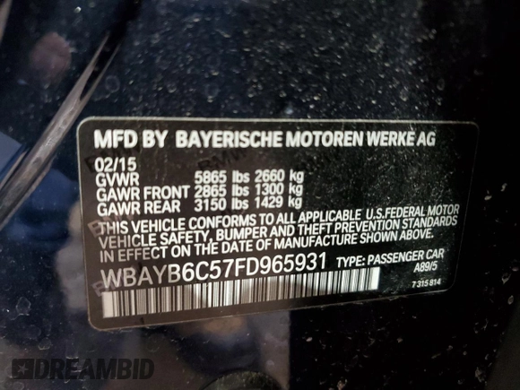 2015 BMW 7 Series 750i xDrive with VIN WBAYB6C57FD965931, listed as a Copart auction lot 44422205 with 100,702 mi miles and Salvage title. Bid and sale history available at DreamBid. Image 12.