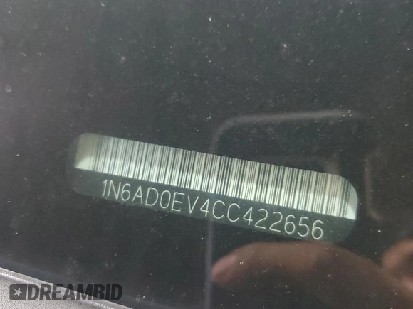 2012 Nissan Frontier Pro-4X with VIN 1N6AD0EV4CC422656, listed as a Copart auction lot 60454985 with 152,535 mi miles and Salvage title. Bid and sale history available at DreamBid. Image 13.