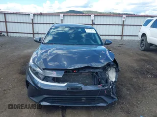 2022 Kia Forte LXS z VIN 3KPF24AD2NE455301, wystawiony jako IAAI lot #42324239 z przebiegiem 56 078 mil mil oraz . Historia ofert i sprzedaży dostępna na DreamBid. Obrazek 13.
