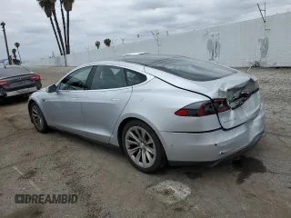 2015 Tesla Model S 85D with VIN 5YJSA1H28FFP78686, listed as a Copart auction lot 53310595 with 69,682 mi miles and Salvage Title. Bid and sale history available at carsss.com. Image 2.