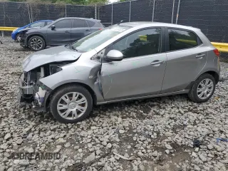 2011 Mazda 2 Touring z VIN JM1DE1HY6B0107477, wystawiony jako Copart lot #56244525 z przebiegiem 131 142 mil mil oraz Szkoda całkowita • Salvage title. Historia ofert i sprzedaży dostępna na DreamBid. Obrazek 1.
