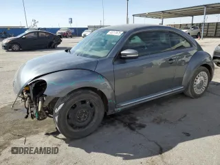 2014 Volkswagen Beetle with VIN 3VWH17AT4EM635371, listed as a Copart auction lot 46317675 with 81,480 mi miles and Salvage Title. Bid and sale history available at DreamBid. Image 1.