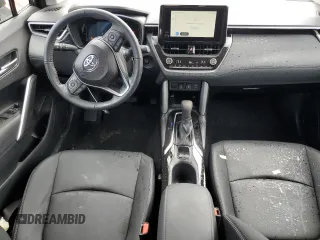2024 Toyota Corolla Cross XLE z VIN 7MUDAABG9RV102170, wystawiony jako Copart lot #53101075 z przebiegiem 1 709 mil mil oraz Szkoda całkowita • Salvage title. Historia ofert i sprzedaży dostępna na DreamBid. Obrazek 8.