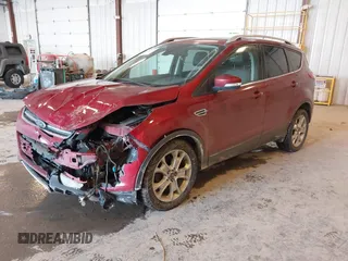 2014 Ford Escape Titanium with VIN 1FMCU0JX6EUC58726, listed as a IAAI auction lot 41656779 with 162,888 mi miles. Bid and sale history available at carsss.com. Image 2.