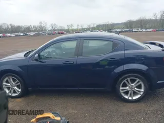 2013 Dodge Avenger SXT with VIN 1C3CDZCG7DN582562, listed as a IAAI auction lot 42084933 with 48,537 mi miles and . Bid and sale history available at carsss.com. Image 14.