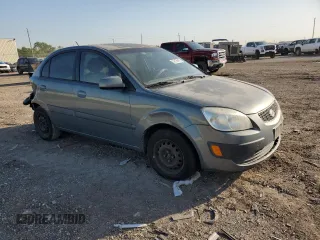 2007 Kia Rio LX with VIN KNADE123X76253489, listed as a Copart auction lot 52176475 with 148,154 mi miles and Salvage Title. Bid and sale history available at carsss.com. Image 4.