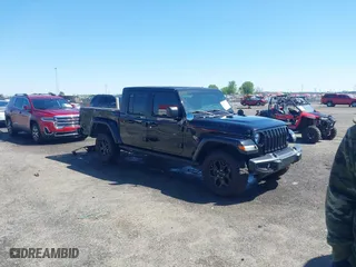 2023 Jeep Gladiator Freedom with VIN 1C6HJTAG1PL526229, listed as a IAAI auction lot 41972084 with 26,021 mi miles. Bid and sale history available at carsss.com. Image 1.