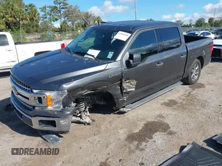 2020 Ford F-150 XL z VIN 1FTEW1CP7LKE32919, wystawiony jako IAAI lot #41082048 z przebiegiem 61 278 mil mil oraz . Historia ofert i sprzedaży dostępna na DreamBid. Obrazek 2.