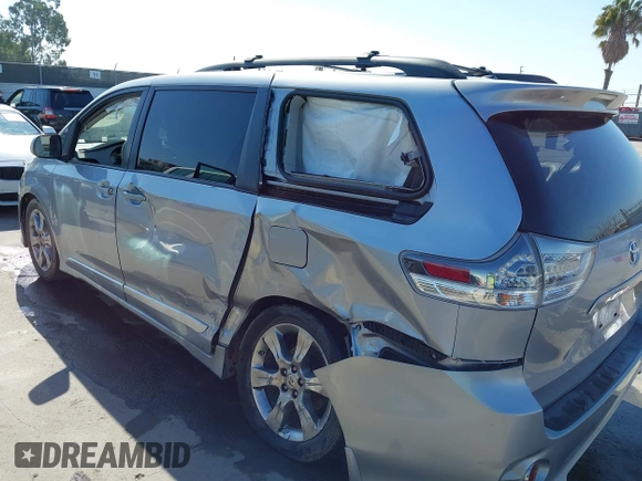 2012 Toyota Sienna SE with VIN 5TDXK3DC3CS189064, listed as a IAAI auction lot 42022390 with 193,016 mi miles and . Bid and sale history available at DreamBid. Image 6.
