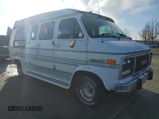 1995 GMC Vandura z VIN 1GDEG25K1SF505970, wystawiony jako Copart lot #87524905 z przebiegiem 130 163 mil mil oraz Tytuł czysty. Historia ofert i sprzedaży dostępna na DreamBid. Obrazek 4.