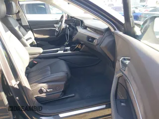 2019 Audi e-tron Prestige with VIN WA1VAAGE2KB021539, listed as a IAAI auction lot 42007353 with 14,238 mi miles and . Bid and sale history available at DreamBid. Image 5.