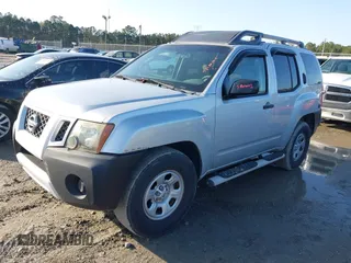 2012 Nissan Xterra X with VIN 5N1AN0NU1CC517484, listed as a IAAI auction lot 41569404 with 225,591 mi miles and . Bid and sale history available at DreamBid. Image 2.