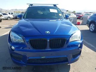 2015 BMW X1 xDrive28i with VIN WBAVL1C56FVY32753, listed as a IAAI auction lot 41759454 with 130,823 mi miles. Bid and sale history available at carsss.com. Image 12.