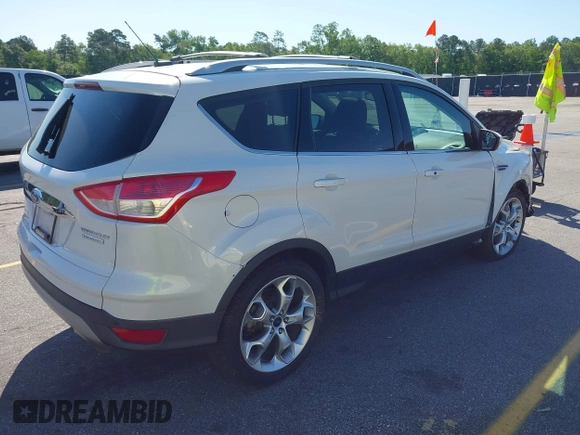 2014 Ford Escape Titanium с VIN 1FMCU0J94EUB92694, выставлен на аукционе IAAI как лот 42124647 с пробегом 107 666 миль миль и . История ставок и продаж доступна на DreamBid. Изображение 4.