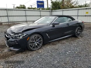 2019 BMW 8 Series M850i xDrive with VIN WBAFY4C58KBX39395, listed as a Copart auction lot 74088834 with 27,413 mi miles and Salvage Title. Bid and sale history available at carsss.com. Image 1.