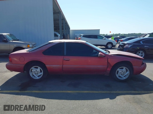 1996 Ford Thunderbird LX z VIN 1FALP62W0TH142986, wystawiony jako IAAI lot #42030900 z przebiegiem 168 993 mil mil oraz . Historia ofert i sprzedaży dostępna na DreamBid. Obrazek 13.