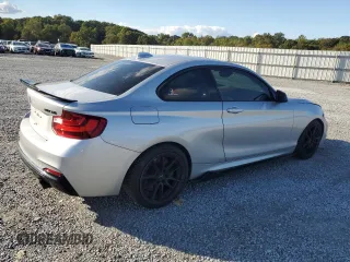 2015 BMW 2 Series M235i with VIN WBA1J7C57FV254038, listed as a Copart auction lot 73657294 with 117,883 mi miles and Salvage Title. Bid and sale history available at carsss.com. Image 3.