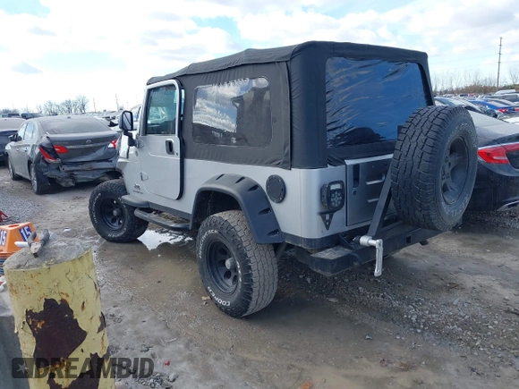 2005 Jeep Wrangler Unlimited with VIN 1J4FA44S25P340852, listed as a IAAI auction lot 41441671 with 139,302 mi miles. Bid and sale history available at carsss.com. Image 3.
