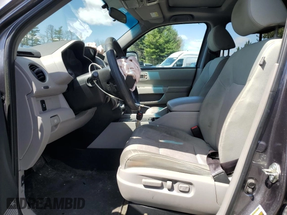 2015 Honda Pilot SE with VIN 5FNYF4H36FB055134, listed as a Copart auction lot 52310075 with 171,753 mi miles and Salvage Title. Bid and sale history available at DreamBid. Image 7.