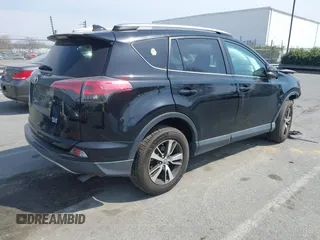 2018 Toyota RAV4 XLE with VIN 2T3RFREV6JW734993, listed as a IAAI auction lot 41790232 with 61,118 mi miles. Bid and sale history available at carsss.com. Image 4.