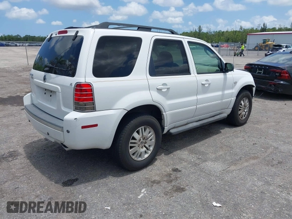 2006 Mercury Mariner Luxury with VIN 4M2YU56116KJ14472, listed as a IAAI auction lot 42349564 with 96,221 mi miles and . Bid and sale history available at DreamBid. Image 4.