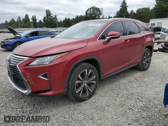 2018 Lexus RX 450hL Premium with VIN JTJDGKCA5J2002701, listed as a Copart auction lot 60258935 with 73,437 mi miles and Salvage title. Bid and sale history available at DreamBid. Image 1.