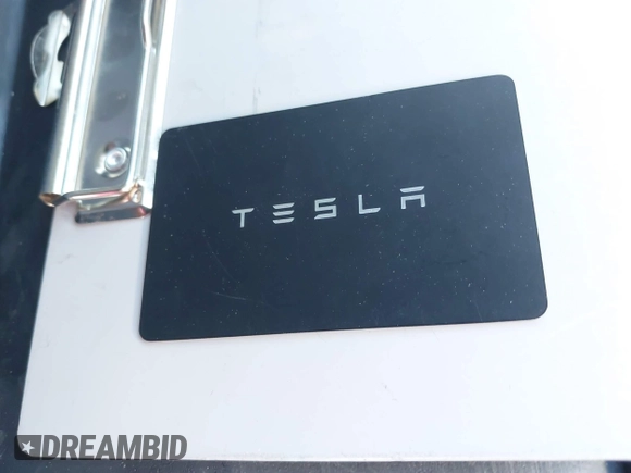 2023 Tesla Model Y Long Range with VIN 7SAYGAEE7PF971620, listed as a IAAI auction lot 41654688 with Not Provided miles and . Bid and sale history available at DreamBid. Image 11.