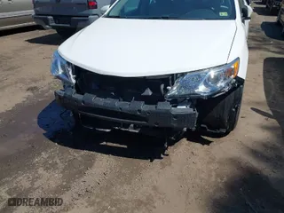 2012 Toyota Camry Hybrid XLE with VIN 4T1BD1FK4CU040019, listed as a IAAI auction lot 41869225 with 95,326 mi miles. Bid and sale history available at carsss.com. Image 6.