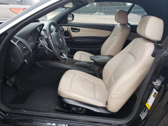 2012 BMW 1 Series 128i with VIN WBAUL7C55CVM83014, listed as a Copart auction lot 86043194 with 0 mi miles and Salvage Title. Bid and sale history available at carsss.com. Image 7.