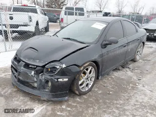 2004 Dodge Neon SRT4 with VIN 1B3ES66S94D642373, listed as a IAAI auction lot 41559811 with NaN miles. Bid and sale history available at carsss.com. Image 18.