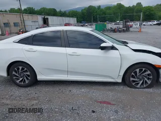 2018 Honda Civic LX with VIN 2HGFC2F59JH576975, listed as a IAAI auction lot 42098020 with 89,791 mi miles and . Bid and sale history available at DreamBid. Image 14.