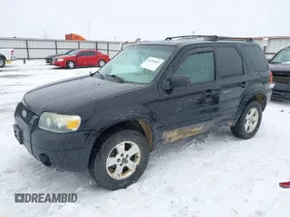 2007 Ford Escape Limited with VIN 1FMYU94147KA28554, listed as a IAAI auction lot 41599603 with 188,391 mi miles. Bid and sale history available at carsss.com. Image 2.