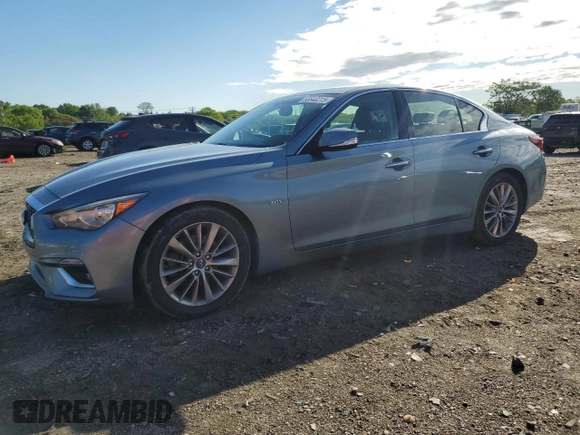 2018 Infiniti Q50 Luxe with VIN JN1EV7APXJM590569, listed as a Copart auction lot 55643215 with 86,965 mi miles and Salvage title. Bid and sale history available at DreamBid. Image 1.