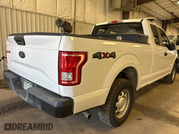 2017 Ford F-150 XL with VIN 1FTEX1E82HKD27618, listed as a IAAI auction lot 42796140 with 124,457 mi miles and . Bid and sale history available at DreamBid. Image 14.