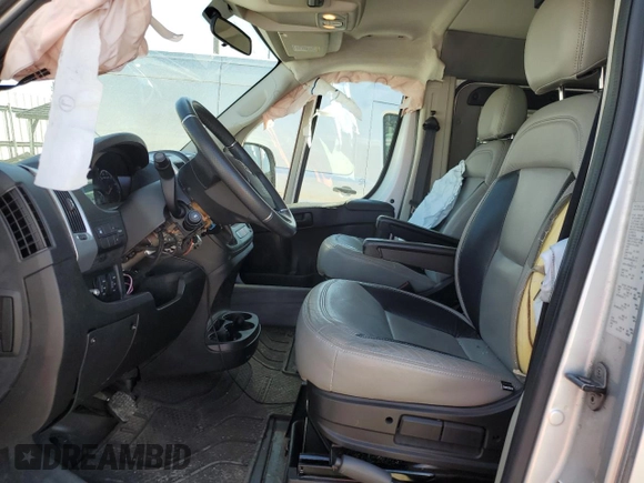 2018 Ram ProMaster Cargo with VIN 3C6TRVAG1JE147424, listed as a Copart auction lot 50696185 with 60,413 mi miles and Salvage Title. Bid and sale history available at DreamBid. Image 7.