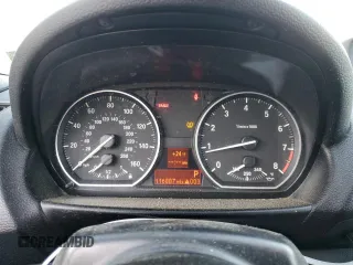 2010 BMW 1 Series 135i with VIN WBAUN9C55AVK41245, listed as a Copart auction lot 87690835 with 116,887 mi miles and Clean Title. Bid and sale history available at carsss.com. Image 9.