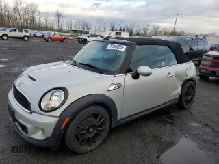 2013 MINI Convertible S with VIN WMWZP3C55DT297215, listed as a Copart auction lot 87995095 with Not Provided miles and Salvage Title. Bid and sale history available at DreamBid. Image 1.