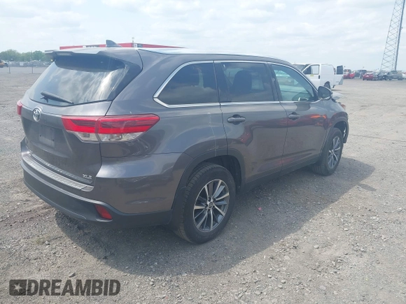 2019 Toyota Highlander SE with VIN 5TDKZRFH3KS353087, listed as a IAAI auction lot 42006593 with 74,214 mi miles and . Bid and sale history available at DreamBid. Image 4.