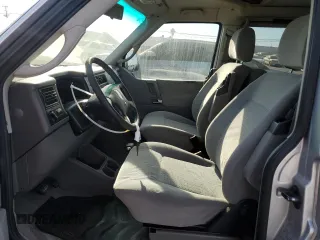 2003 Volkswagen EuroVan MV с VIN WV2NB47043H011247, выставлен на аукционе Copart как лот 85056064 с пробегом 190 282 миль миль и Списание • Salvage title. История ставок и продаж доступна на DreamBid. Изображение 7.